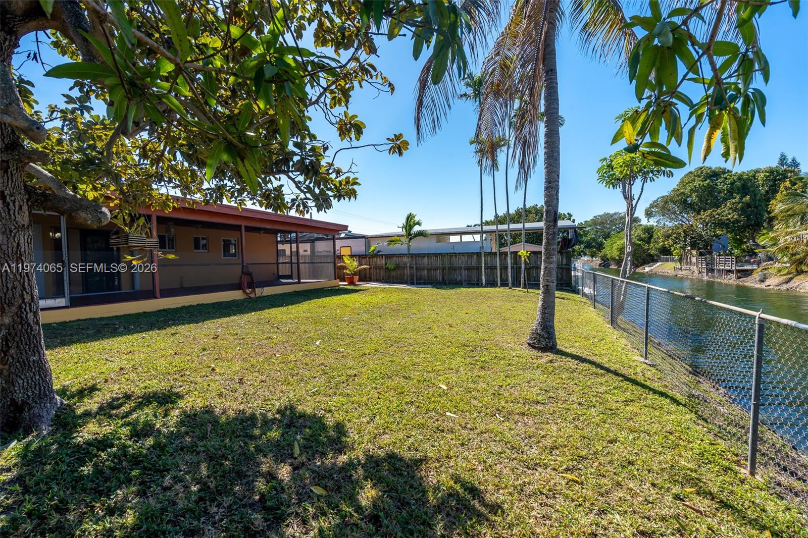 4600 Southwest 104th Avenue Miami, FL 33165 - Photo 4 of 40 a view of a swimming pool with a backyard
