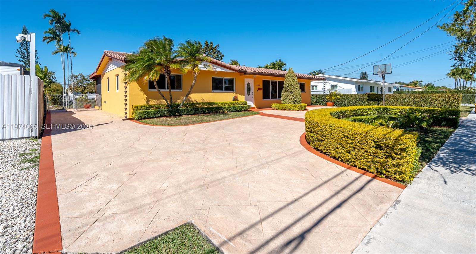 4600 Southwest 104th Avenue Miami, FL 33165 - Photo 8 of 40 a view of a house with palm trees