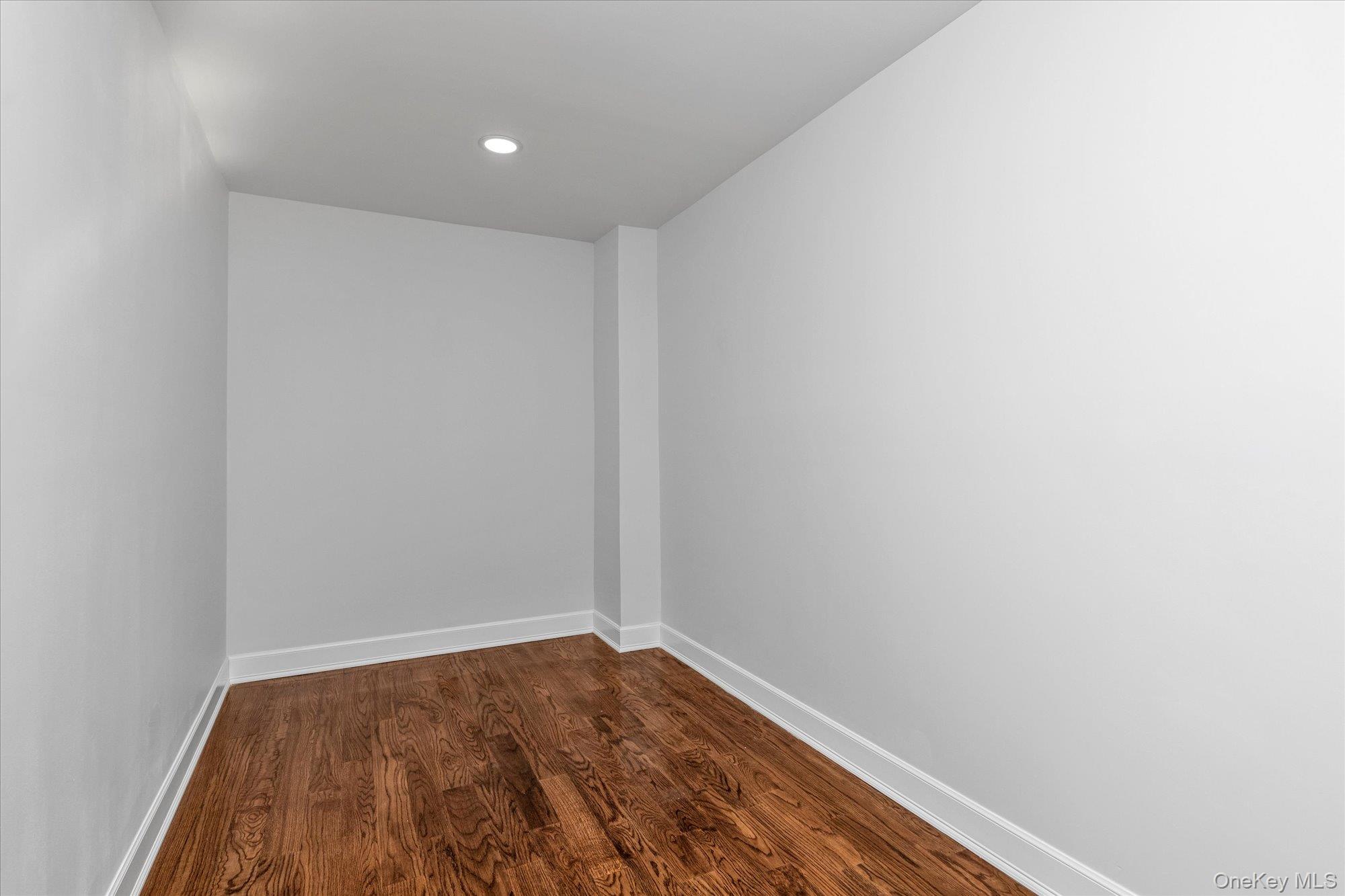 33 Prentice Road Levittown, NY 11756 - Photo 16 of 24 a view of small space with wooden floor