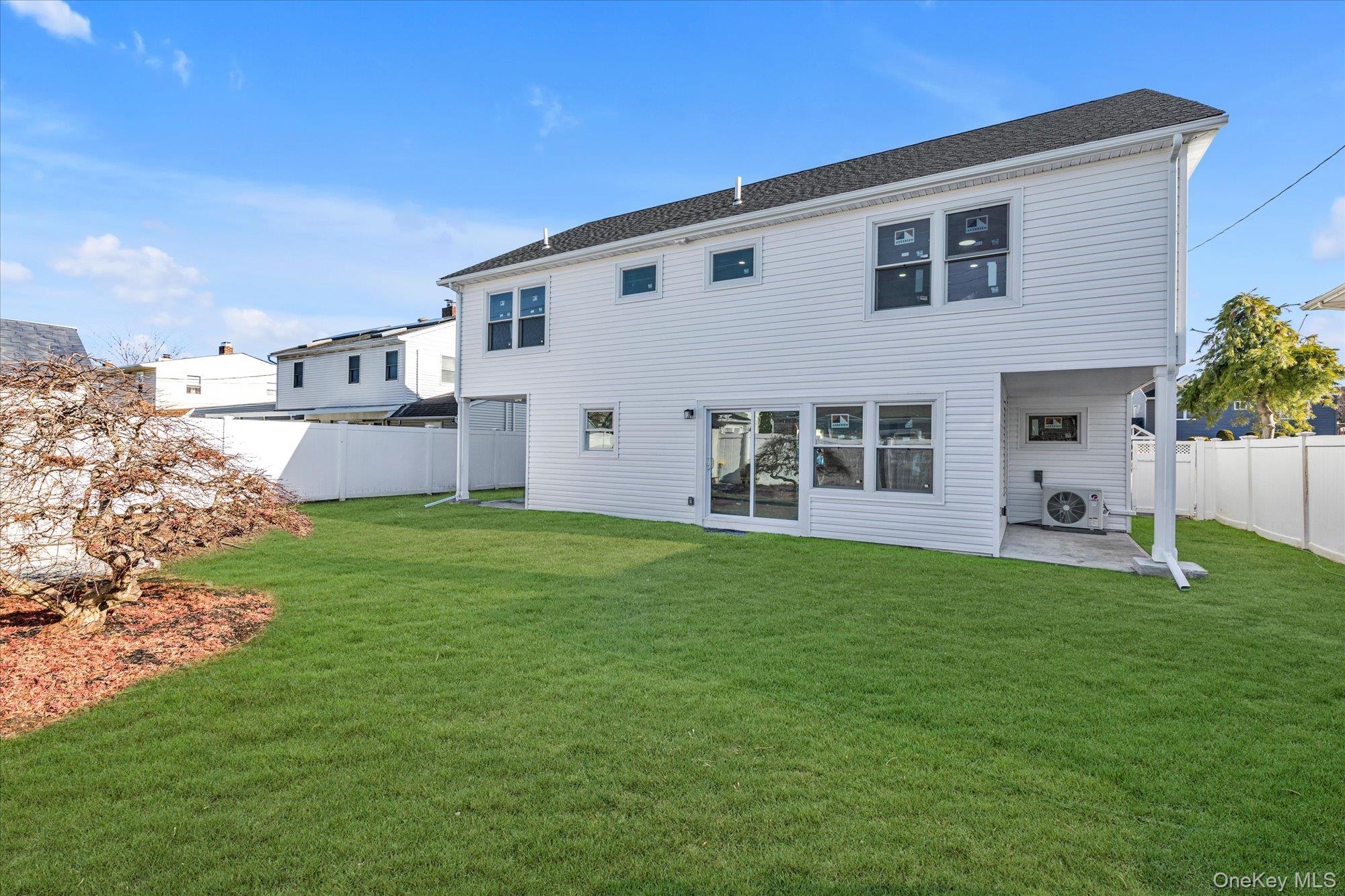 33 Prentice Road Levittown, NY 11756 - Photo 23 of 24 a view of an house with backyard space and garden