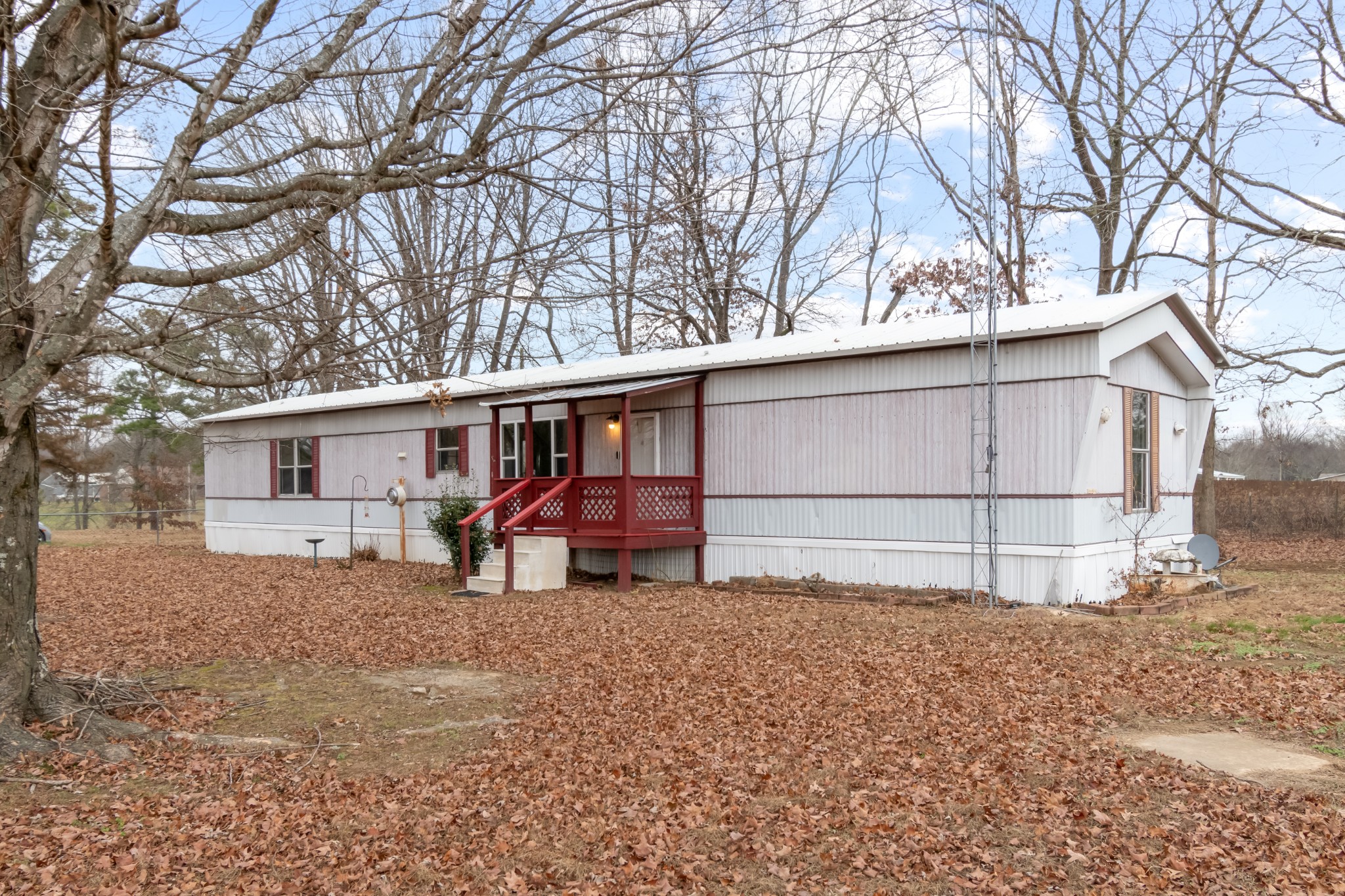 640 Powell Chapel Road Pulaski, TN 38478 - Photo 32 of 50 a view of a house with a yard and garage