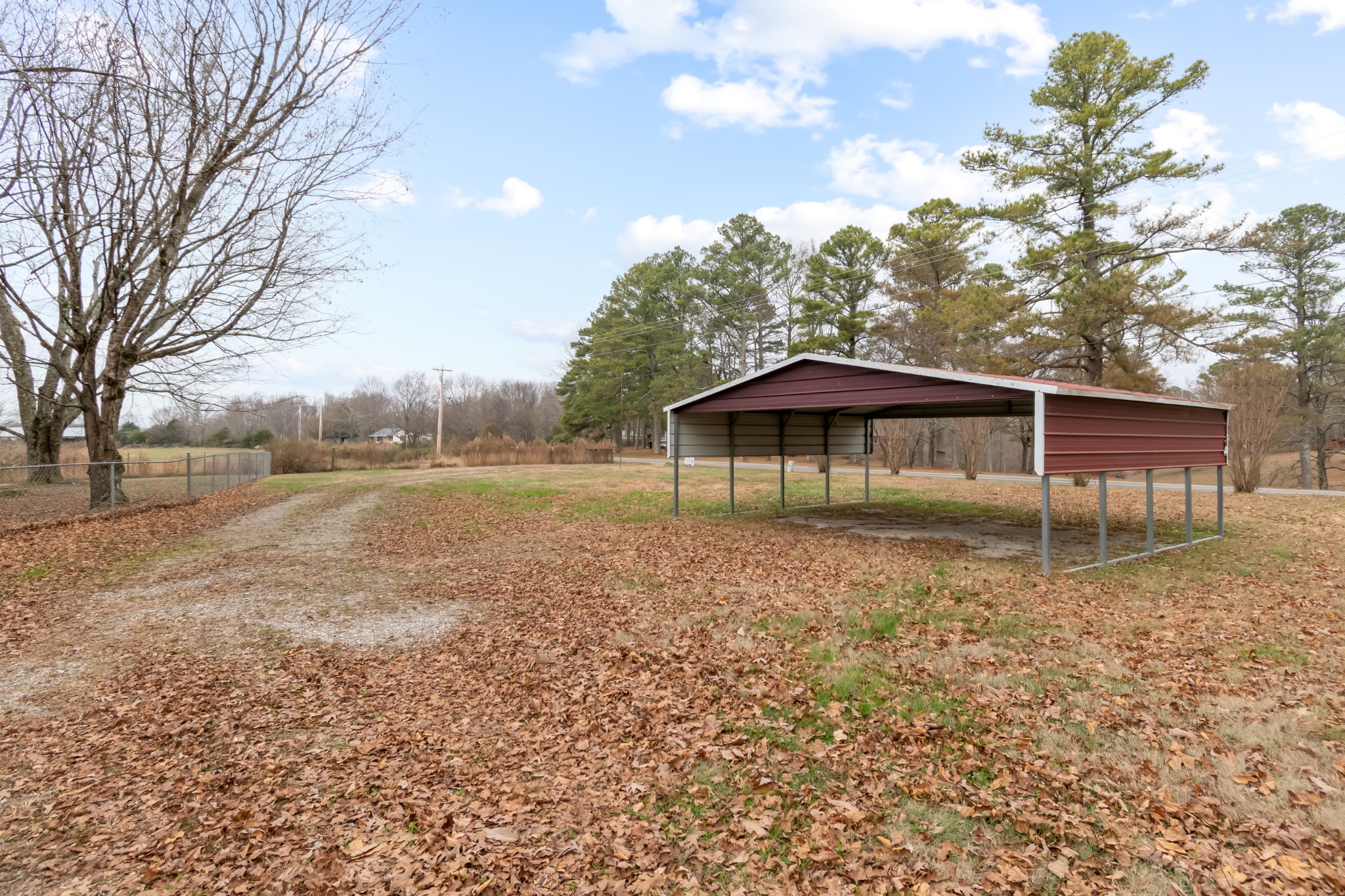 640 Powell Chapel Road Pulaski, TN 38478 - Photo 38 of 50 a backyard of a house with table and chairs