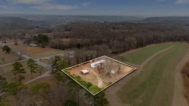 a view of a yard from a balcony