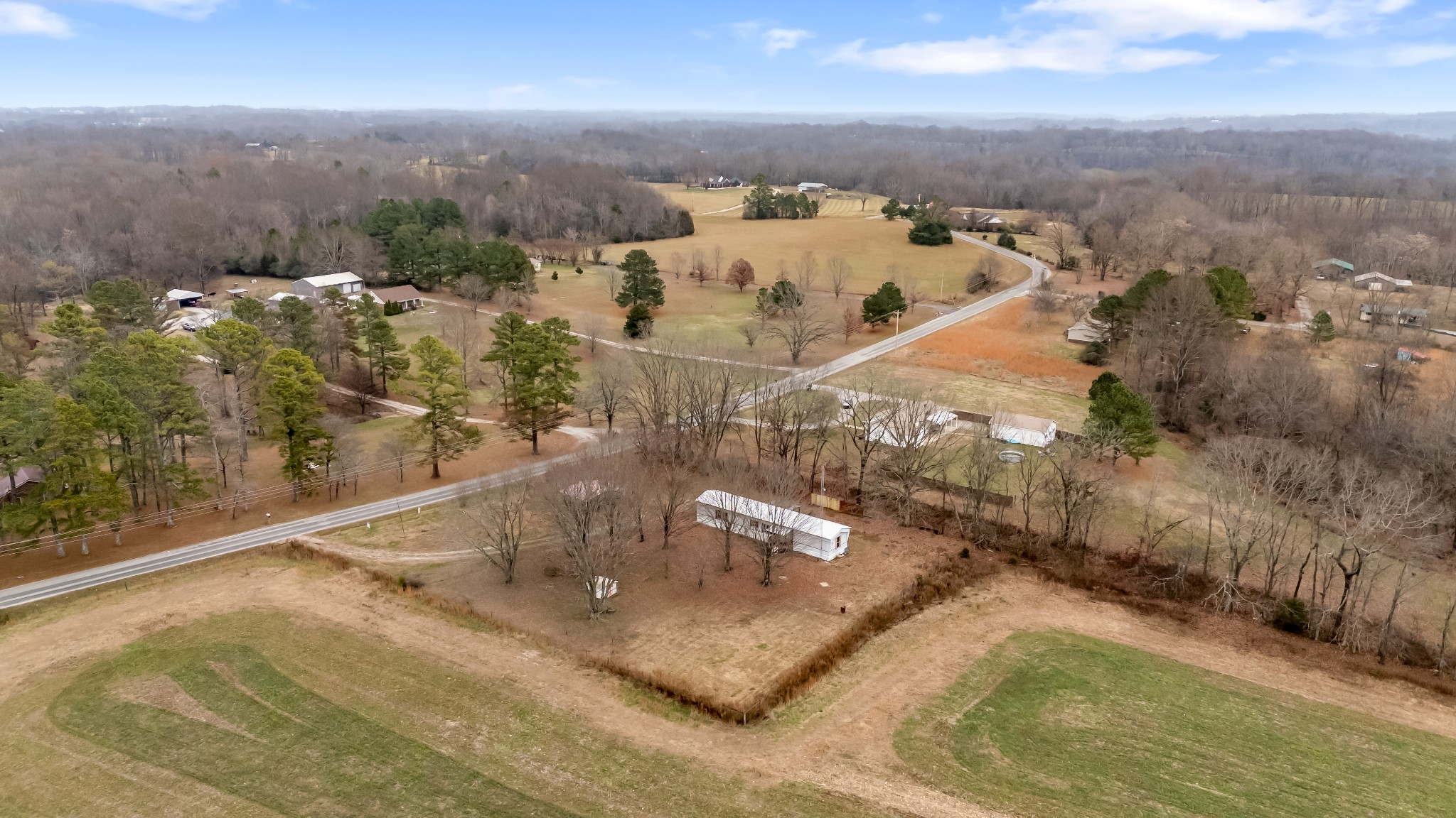 640 Powell Chapel Road Pulaski, TN 38478 - Photo 44 of 50 an aerial view of a house with a yard