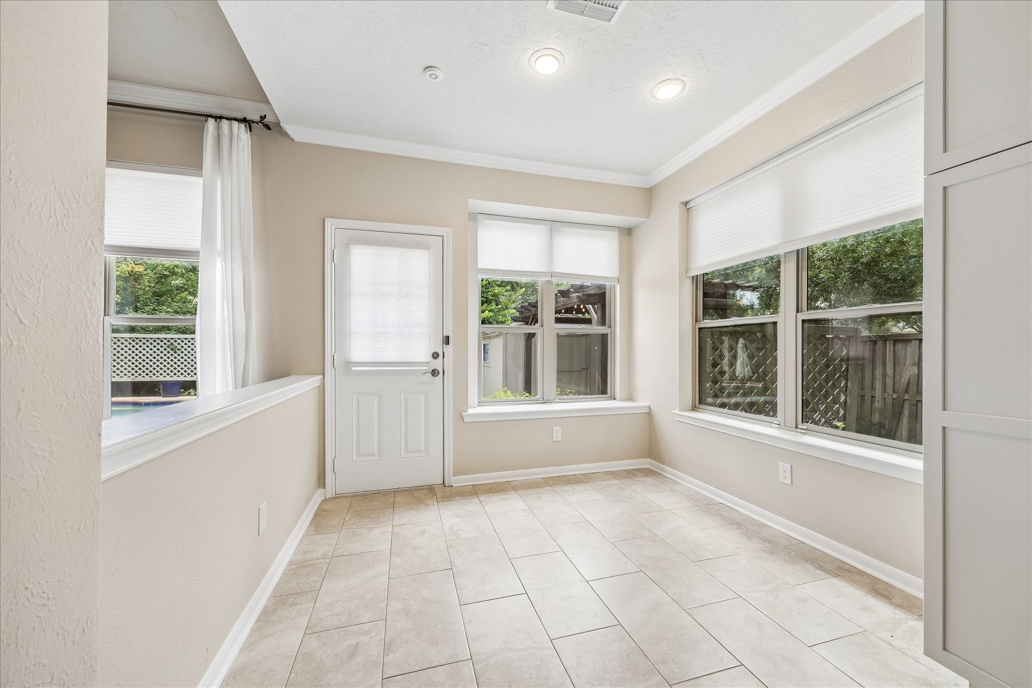 5811 Walkabout Way Katy, TX 77450 - Photo 10 of 33 Sunny breakfast nook overlooking the backyard, creating the perfect spot for casual dining and morning coffee.