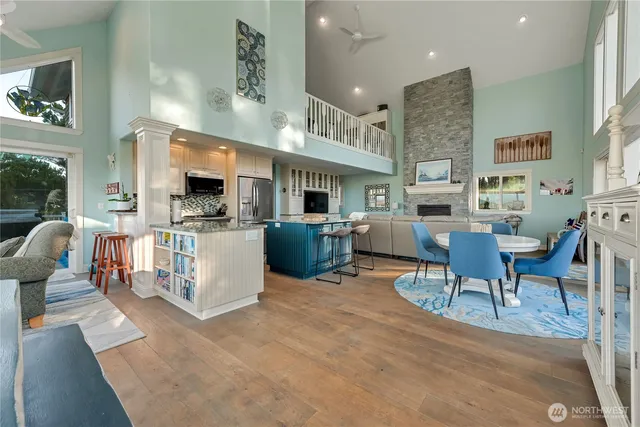 a room with a bed and a table in it