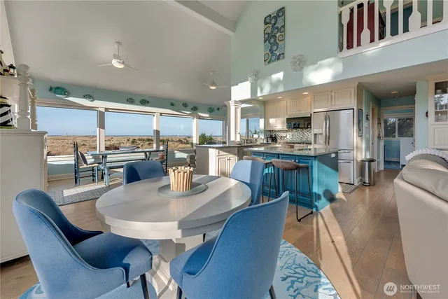 a bedroom with a large bed and a flat screen tv