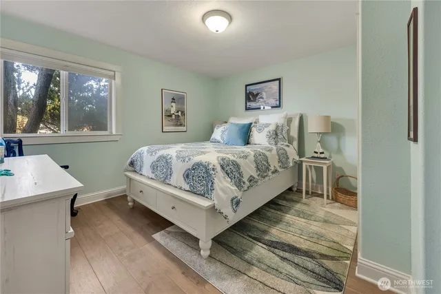 a view of a chairs and table in the balcony
