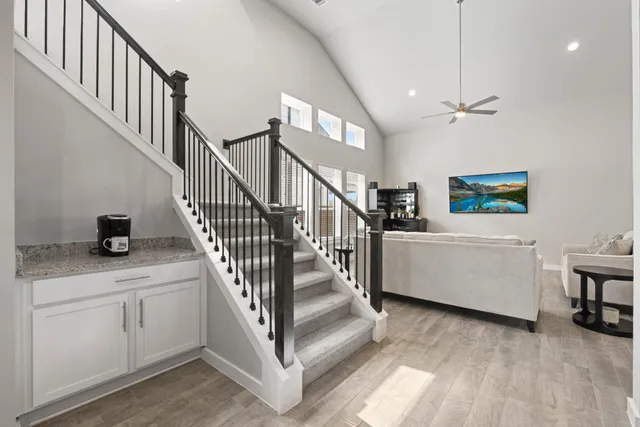 a living room with furniture and a window