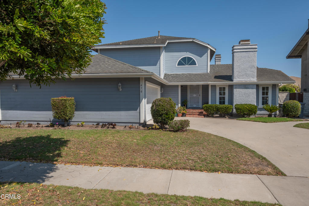 670 Joliet Place Oxnard, CA 93030 - Photo 1 of 33 a front view of a house with garden