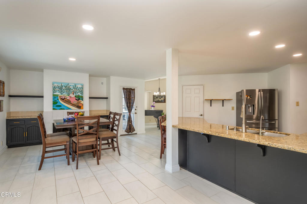 670 Joliet Place Oxnard, CA 93030 - Photo 11 of 33 a view of a kitchen and dining room