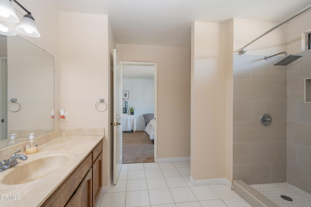 670 Joliet Place Oxnard, CA 93030 - Photo 24 of 33 a bathroom with a sink and a mirror