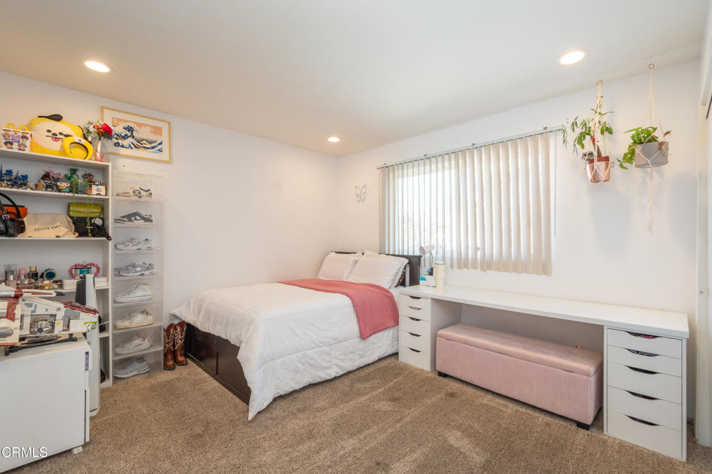 670 Joliet Place Oxnard, CA 93030 - Photo 25 of 33 a spacious bedroom with a bed and a window