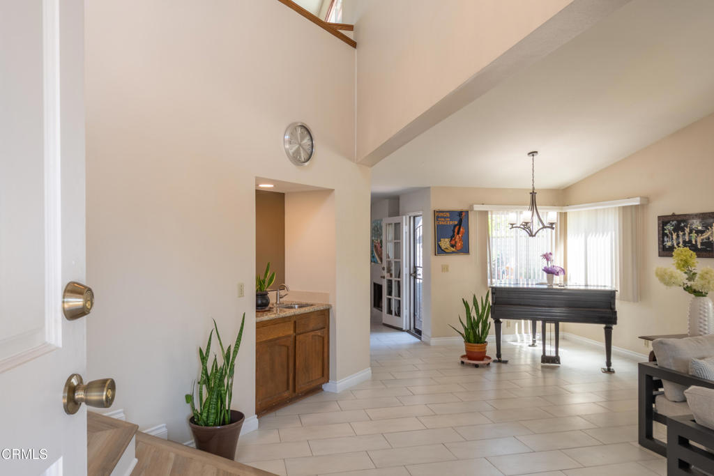 670 Joliet Place Oxnard, CA 93030 - Photo 4 of 33 a view of a livingroom with furniture window and kitchen view