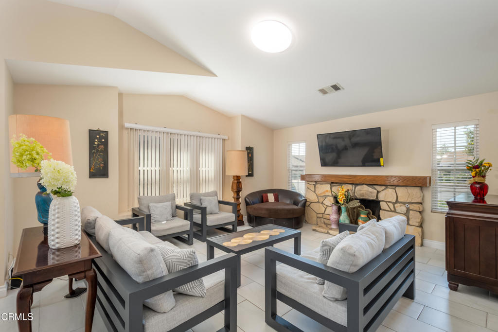 670 Joliet Place Oxnard, CA 93030 - Photo 7 of 33 a living room with furniture and a flat screen tv