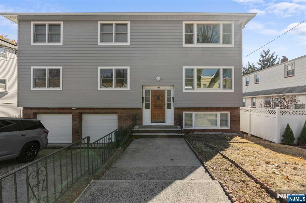 743 7th Street, Unit 1 Carlstadt, NJ 07072 - Photo 22 of 23 a view of a brick house with many windows