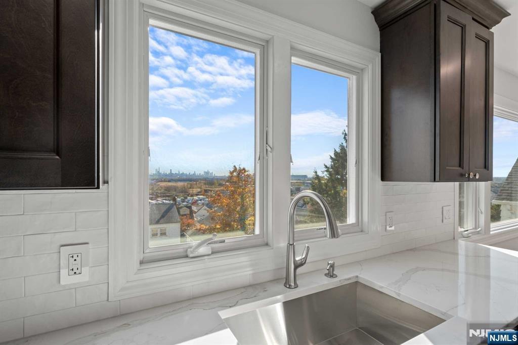 743 7th Street, Unit 1 Carlstadt, NJ 07072 - Photo 6 of 23 a kitchen with a sink and a large window