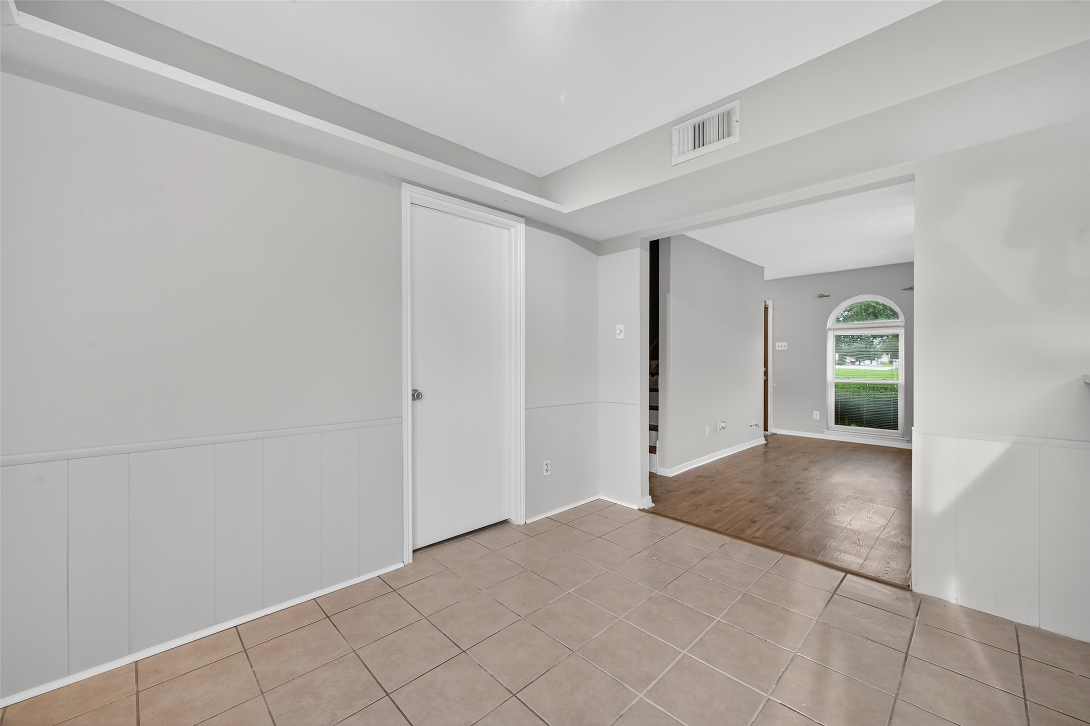 1445 Bonanza Road, Unit 445 Houston, TX 77062 - Photo 12 of 34 a view of a livingroom with wooden floor and a window