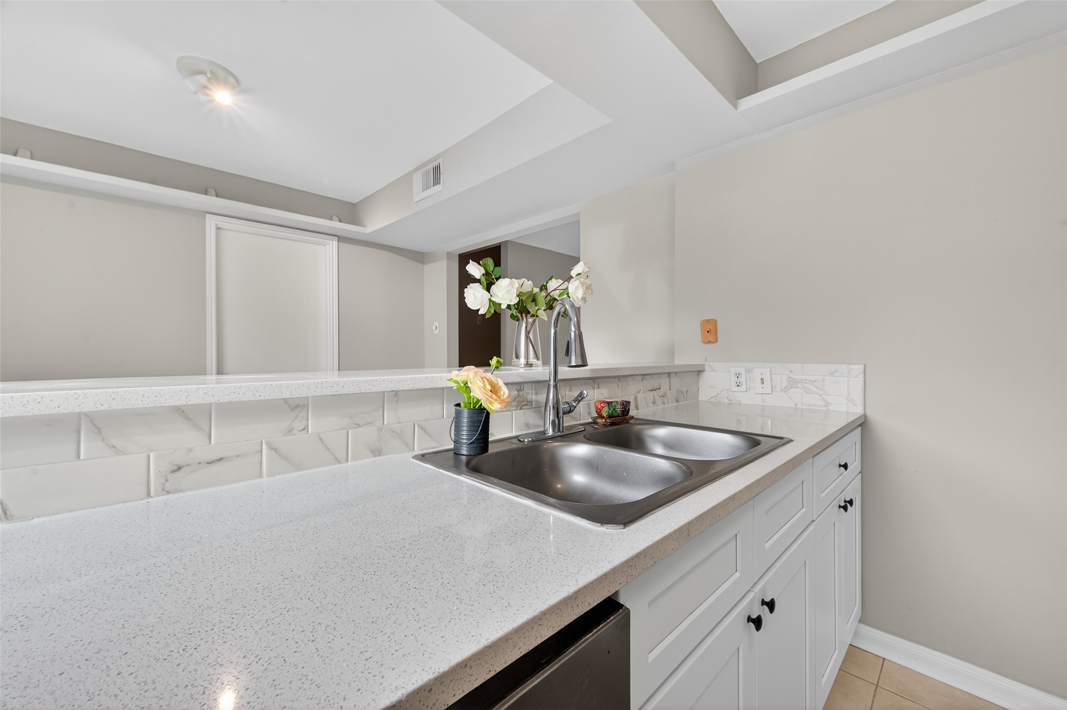 1445 Bonanza Road, Unit 445 Houston, TX 77062 - Photo 15 of 34 a kitchen with a sink cabinets and window
