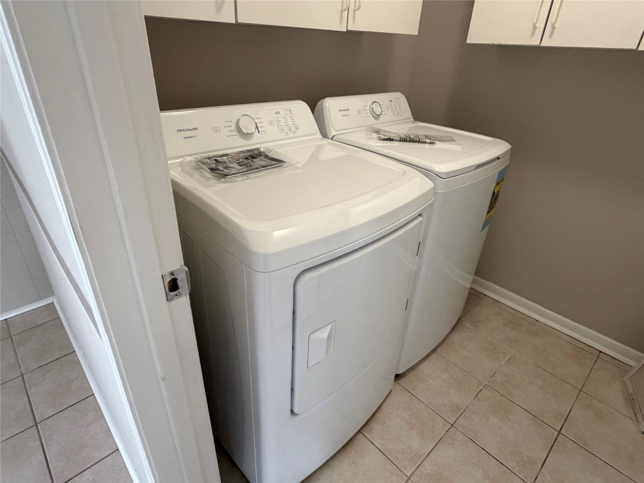 1445 Bonanza Road, Unit 445 Houston, TX 77062 - Photo 20 of 34 a utility room with dryer and washer