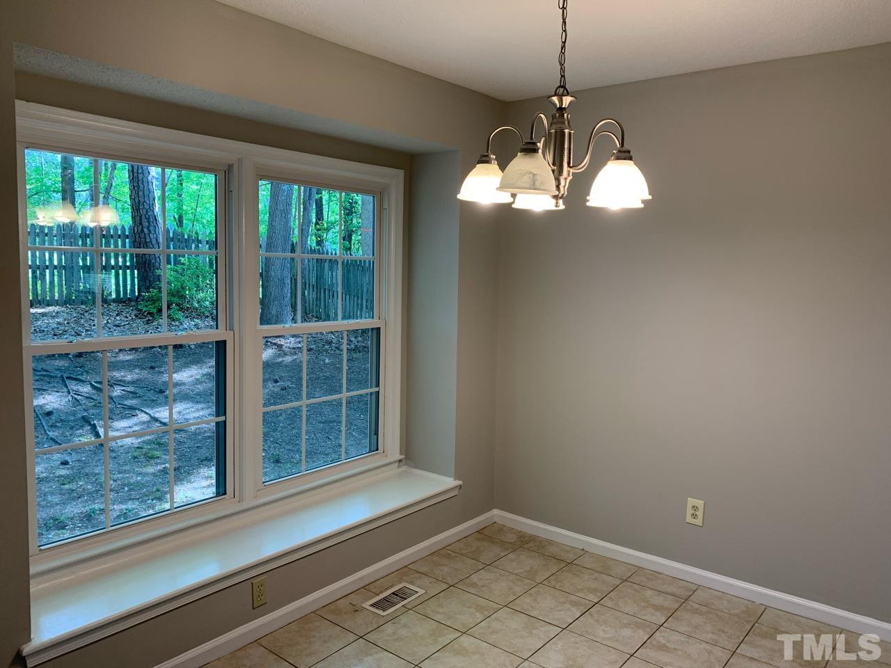 5208 Wallingford Drive Raleigh, NC 27616 - Photo 13 of 15 a view of a room with windows