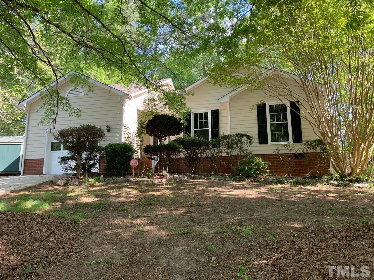 5208 Wallingford Drive Raleigh, NC 27616 - Photo 2 of 15 a view of a house with backyard and sitting area