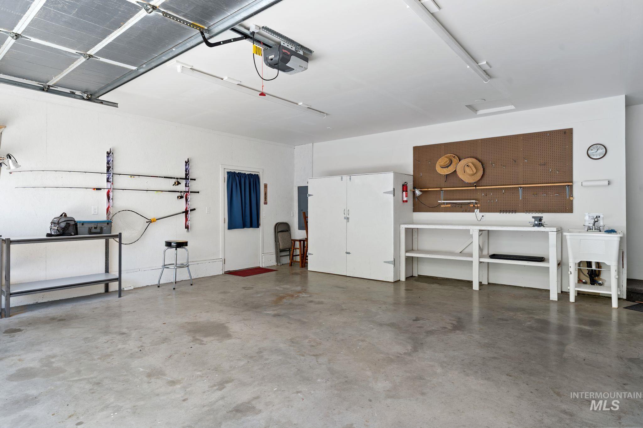 20015 Clark Street Juliaetta, ID 83535 - Photo 28 of 46 Spacious garage featuring concrete flooring and a white ceiling