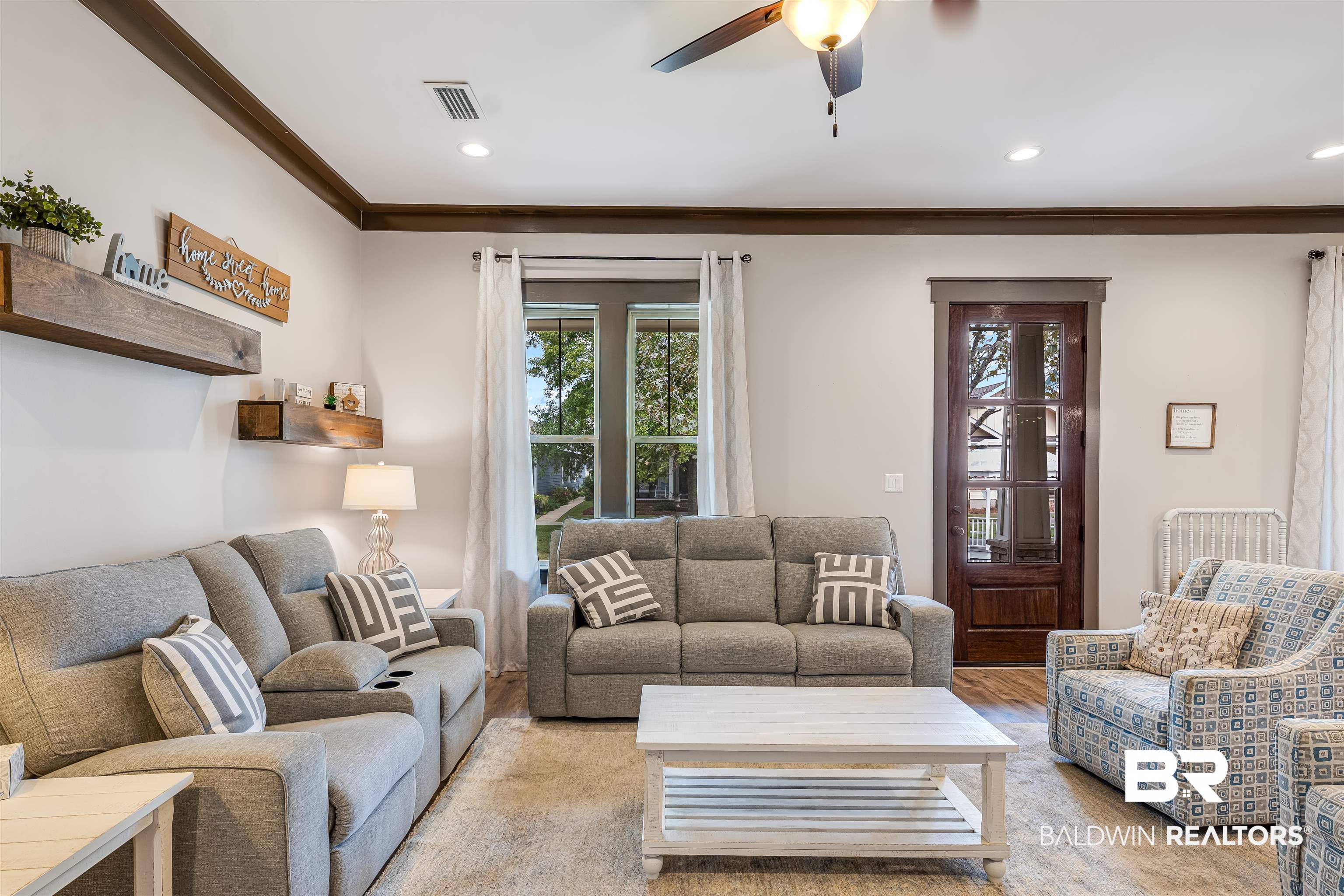1119 Pink Poppy Lane Foley, AL 36535 - Photo 27 of 38 Living area featuring wood finished floors, crown molding, a ceiling fan, and recessed lighting