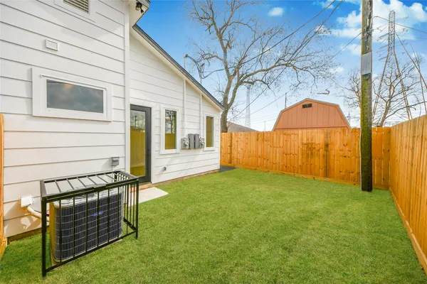 a view of a back yard of the house