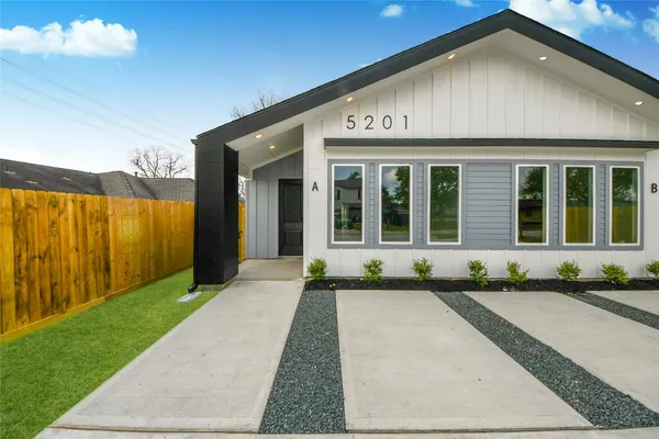 a front view of a house having yard
