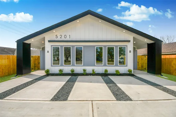 a front view of a house having yard