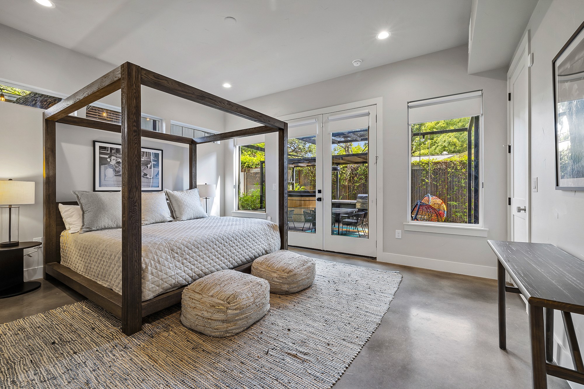 2414 Kinney Road Austin, TX 78704 - Photo 12 of 40 a bedroom with a large bed and a window