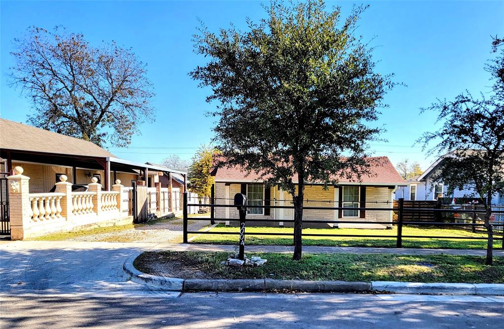 2004 Prairie Avenue Fort Worth, TX 76164 - Photo 2 of 21 a front view of a house with a yard