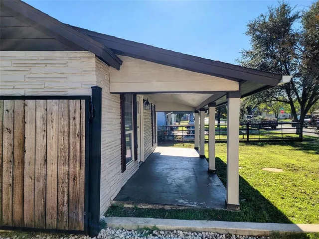 a view of a swimming pool with seating area