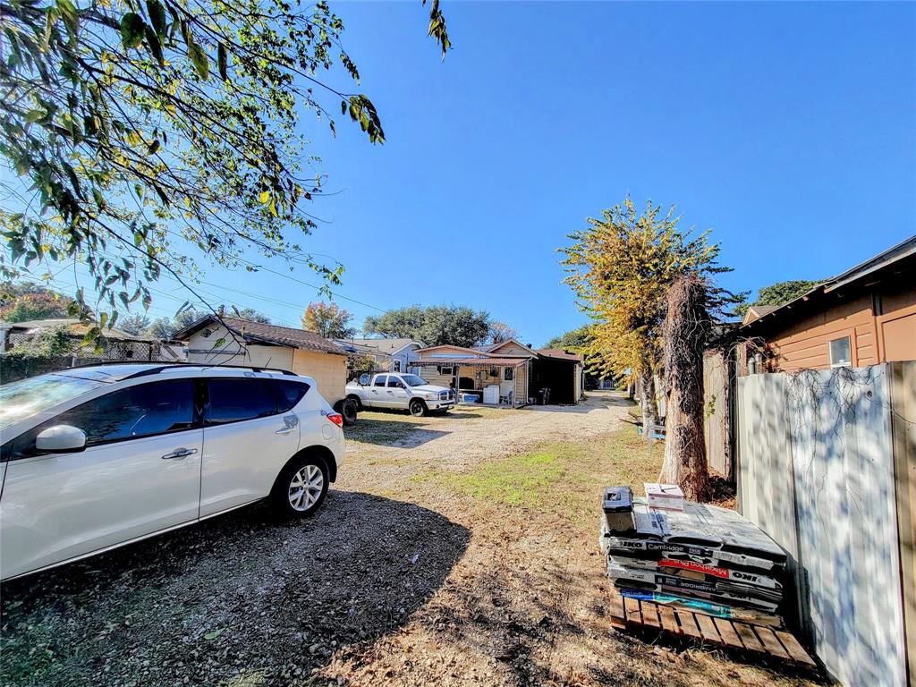 2004 Prairie Avenue Fort Worth, TX 76164 - Photo 8 of 21 a car parked in front of a house