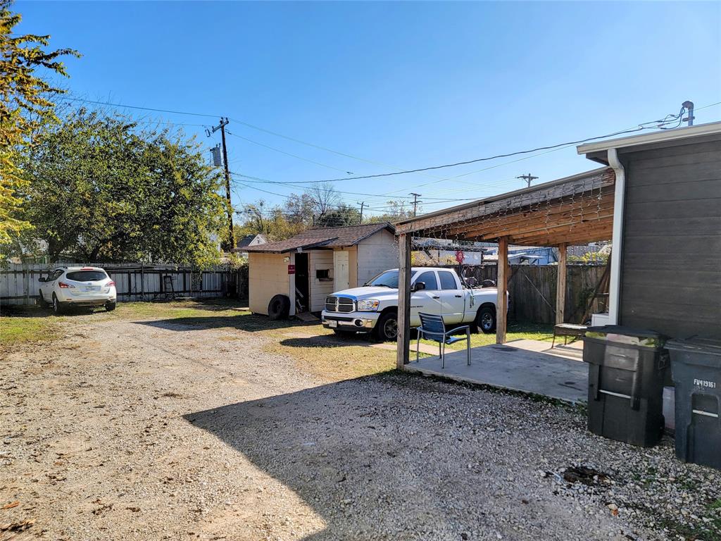 2004 Prairie Avenue Fort Worth, TX 76164 - Photo 9 of 21 a view of a house with backyard and sitting area