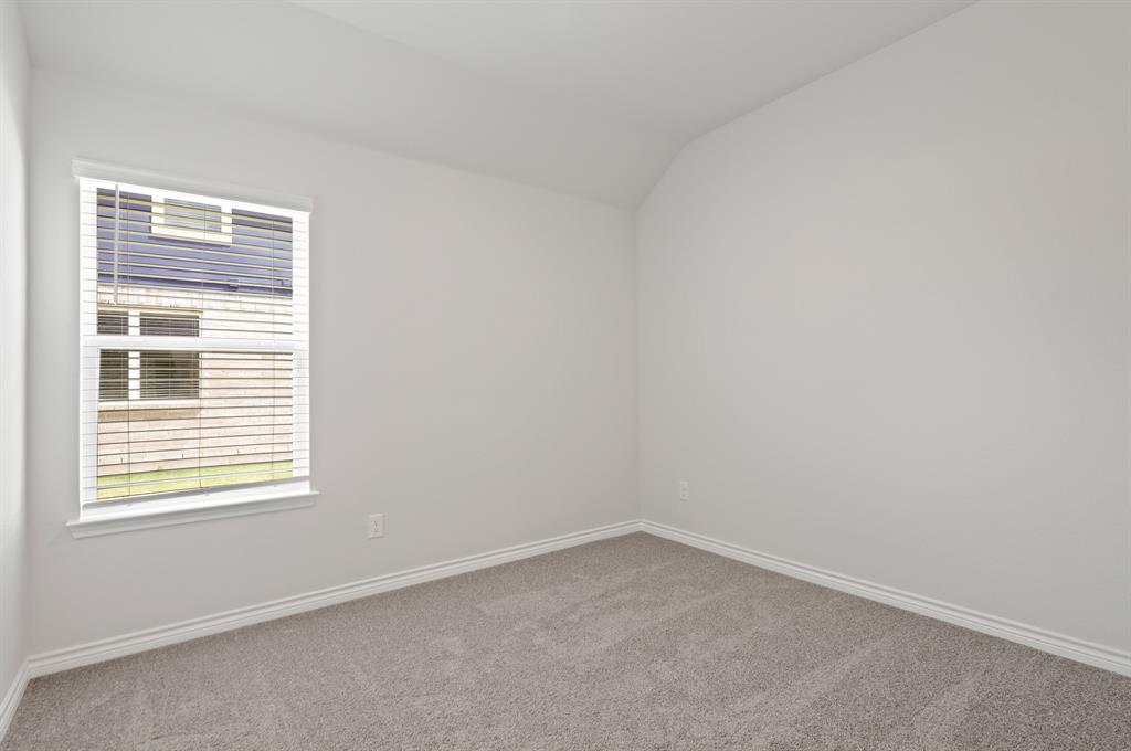 3117 Harmony Way Cleburne, TX 76031 - Photo 11 of 20 an empty room with a window