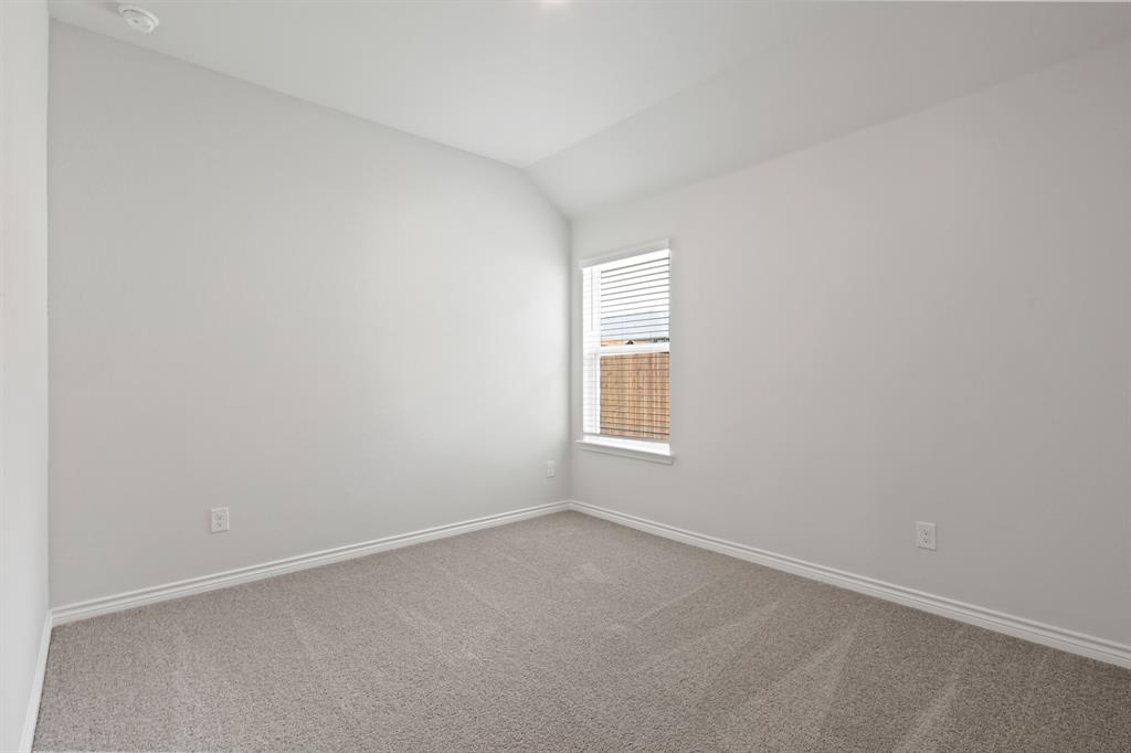 3117 Harmony Way Cleburne, TX 76031 - Photo 12 of 23 an empty room with a window