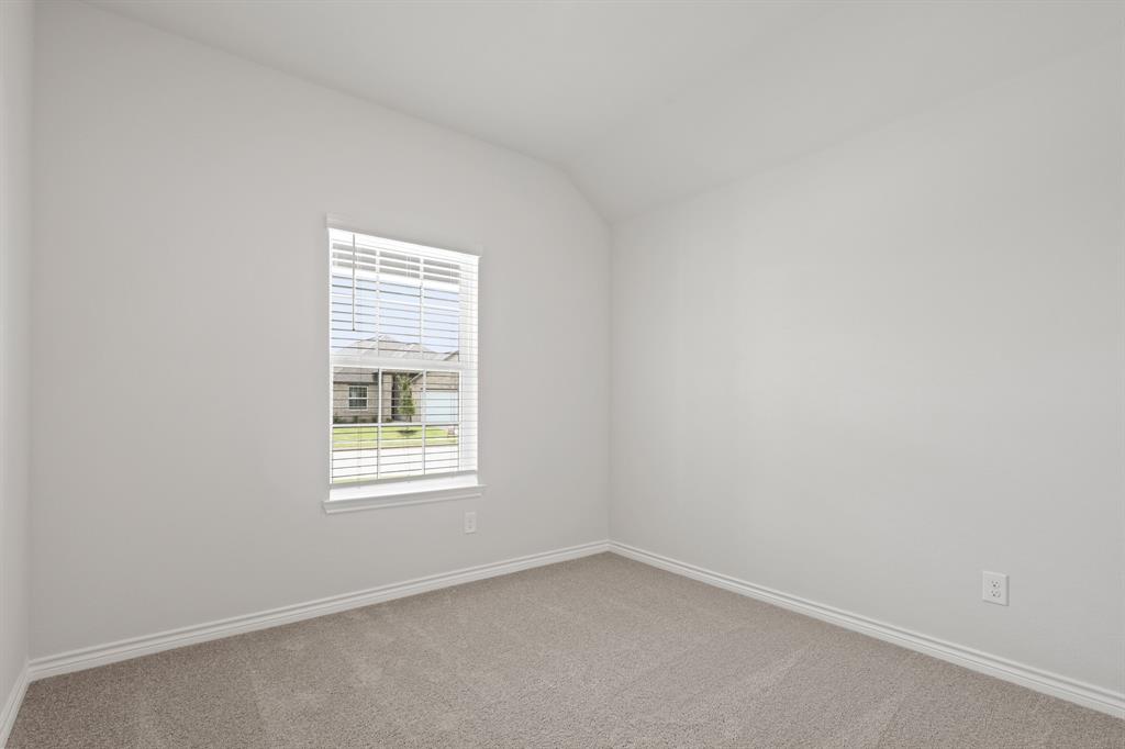 3117 Harmony Way Cleburne, TX 76031 - Photo 15 of 23 an empty room with a window