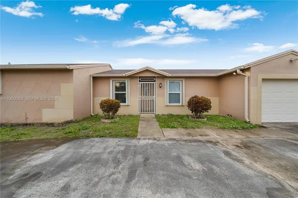 $640,000 | 20103 Northwest 57th Place, Hialeah, FL 33015