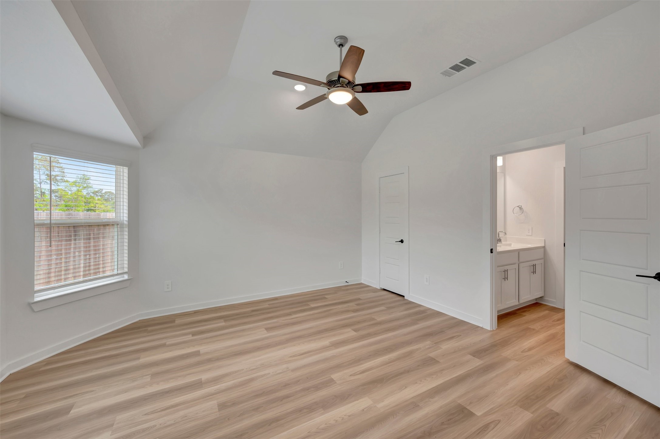 759 Hackberry Branch Magnolia, TX 77354 - Photo 32 of 43 wooden floor in an empty room with a window