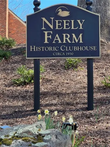 a front view of residential houses with yard