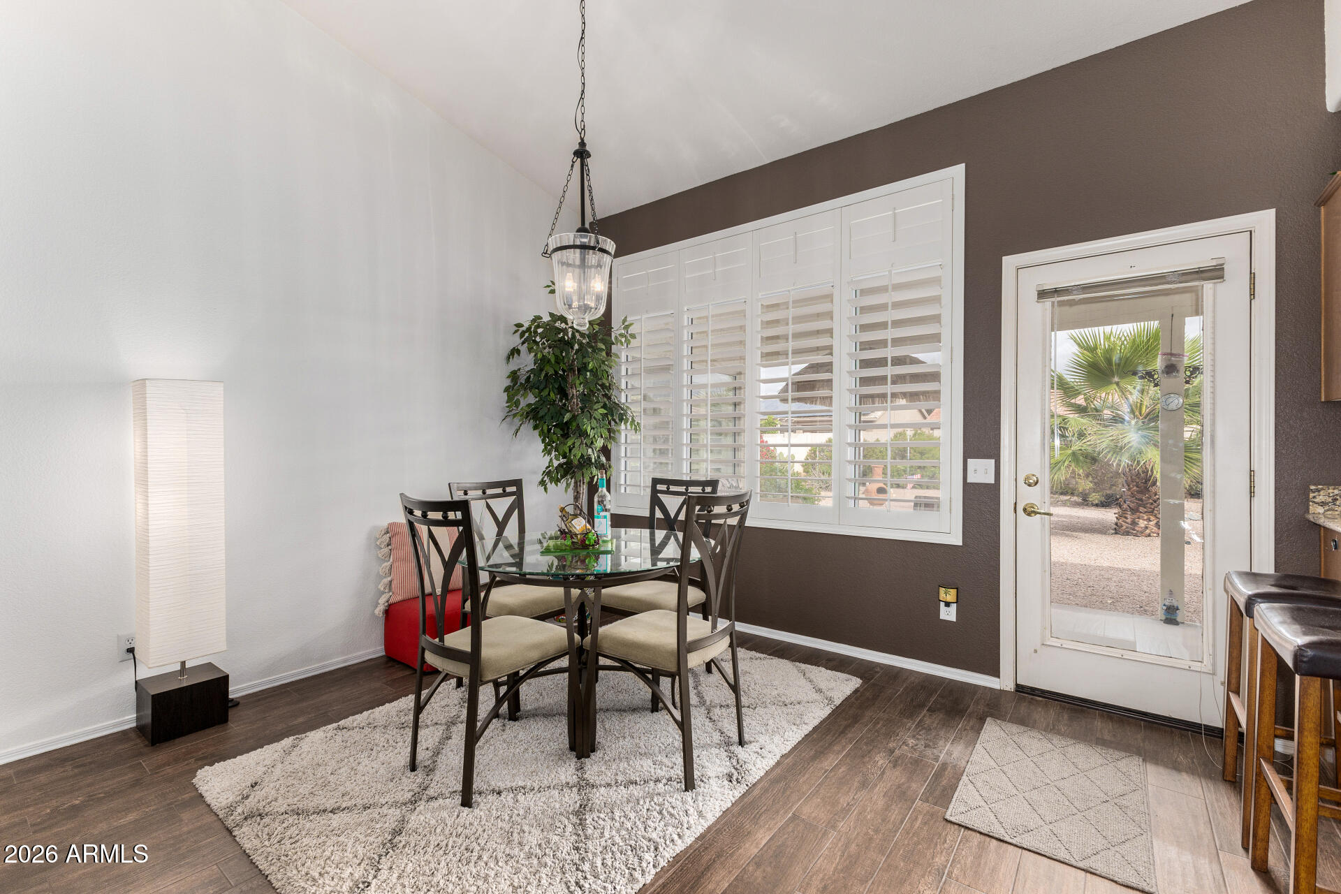 15764 Piccadilly Road Goodyear, AZ 85395 - Photo 7 of 31 a dining room with furniture and window