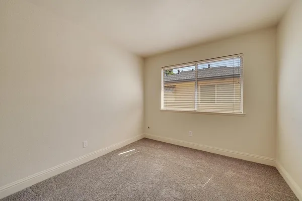 an aerial view of a house with a garden