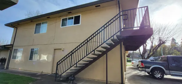 a view of car parked in outdoor space