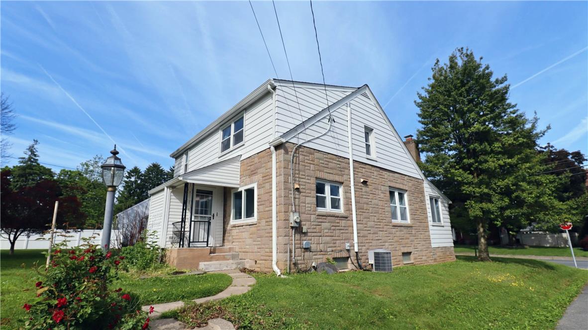 172 Harrison Street Emmaus, PA 18049 - Photo 26 of 30 A classic exterior , nestled among mature trees and lush landscaping.