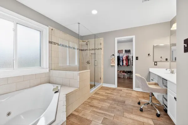 a bathroom with a toilet and a shower curtain