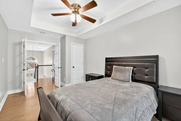 a backyard of a house with a tree