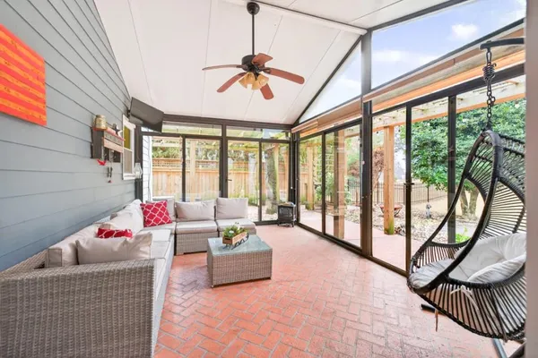 a view of a house with basketball court