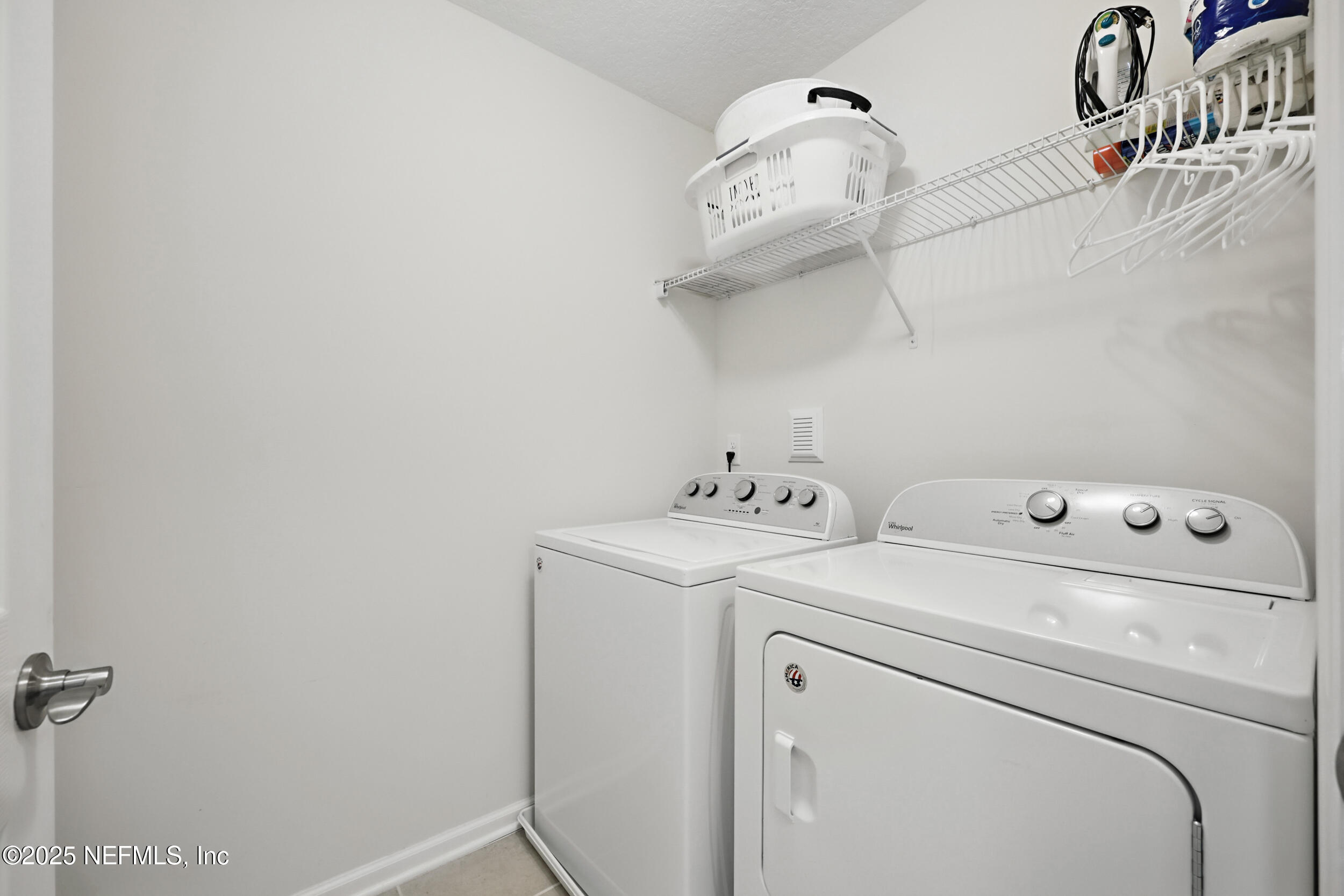 63 Via Sonrisa St. Augustine, FL 32092 - Photo 30 of 48 a utility room with dryer and washer